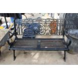 A DECORATIVE WOODEN SLATTED GARDEN BENCH WITH DECORATIVE CAST ENDS AND BACK