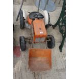 A VINTAGE AND RETRO SHARNA JUPITER CHILDS RIDE ALONG TRACTOR WITH FRONT END LOADER