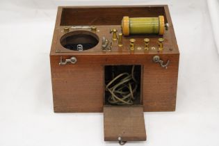 A VINTAGE ELECTRONIC MEDICAL APPLIANCE - IN OAK CASE