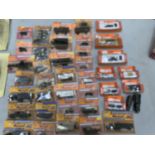 A LARGE COLLECTION OF BOXED ROCO-HO MODEL MINIATURE MILITARY VEHICLES AND SOLDIERS