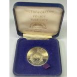 A SILVER TOWER MINT METROPOLITAN POLICE 150TH ANNIVERSARY MEDAL IN A PRESENTATION BOX