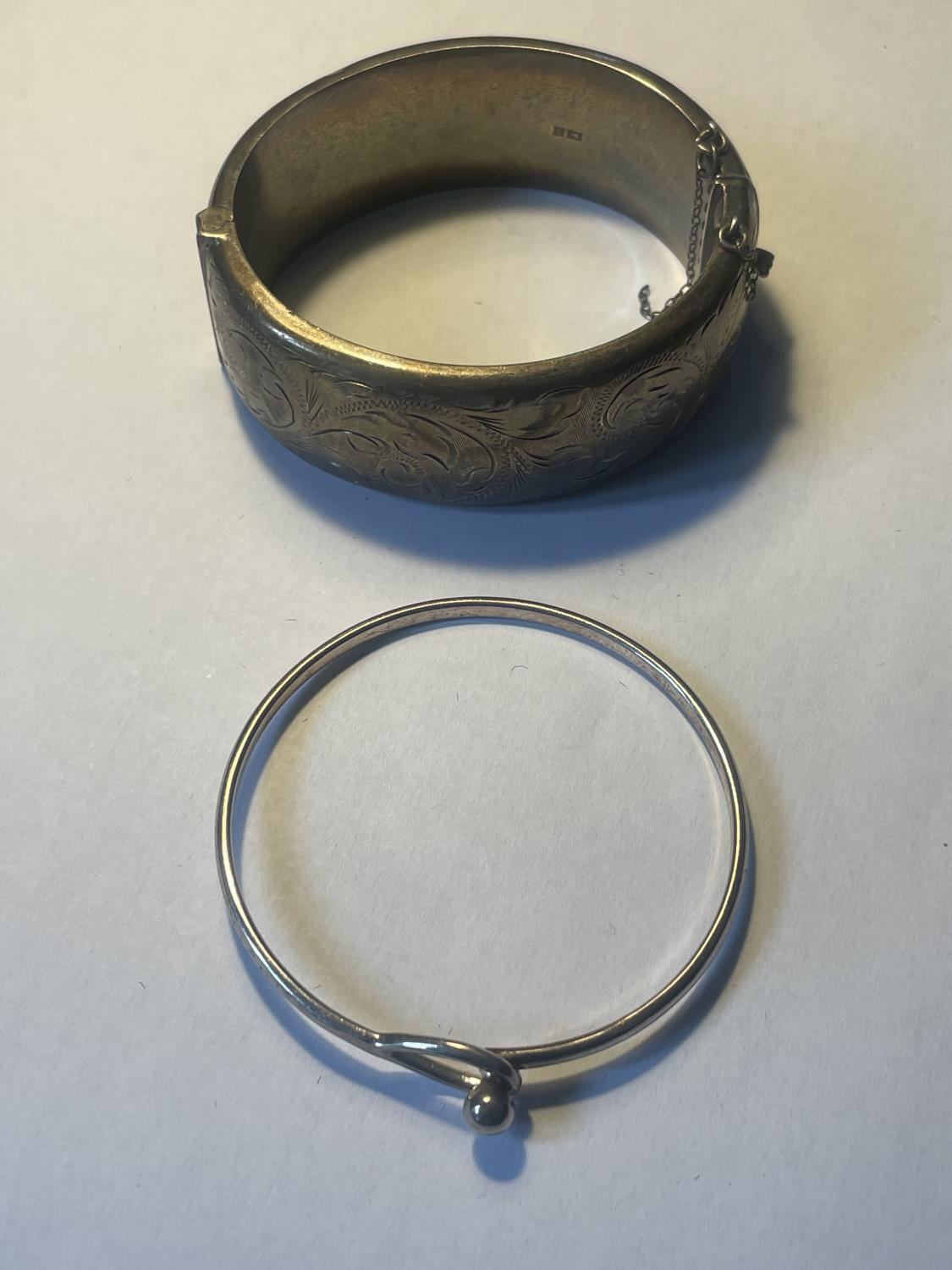 TWO SILVER BANGLES