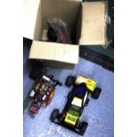 TWO LARGE REMOTE CONTROL RACING CARS AND SPARE TYRES, ETC FOR RESTORATION