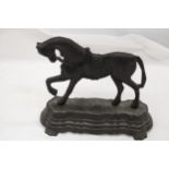 A VICTORIAN BLACK CAST IRON HORSE DOOR STOP - APPROXIMATELY 23CM X 23CM