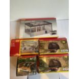 FIVE BOXED HORNBY MODELS TO INCLUDE FUEL OIL TANKS, DOUBLE STONE TUNNEL PORTALS, A DIESEL