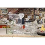 A QUANTITY OF GLASSWARE TO INCLUDE, LARGE VASES, BOTTLES, ETC