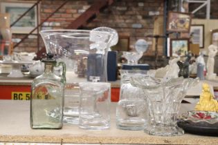 A QUANTITY OF GLASSWARE TO INCLUDE, LARGE VASES, BOTTLES, ETC