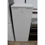 A WHITE BUSH UPRIGHT FRIDGE