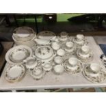 A ROYAL DOULTON 'LARCHMONT' DINNER SERVICE, TO INCLUDE VARIOUS SIZES OF PLATES, A SERVING TUREEN AND