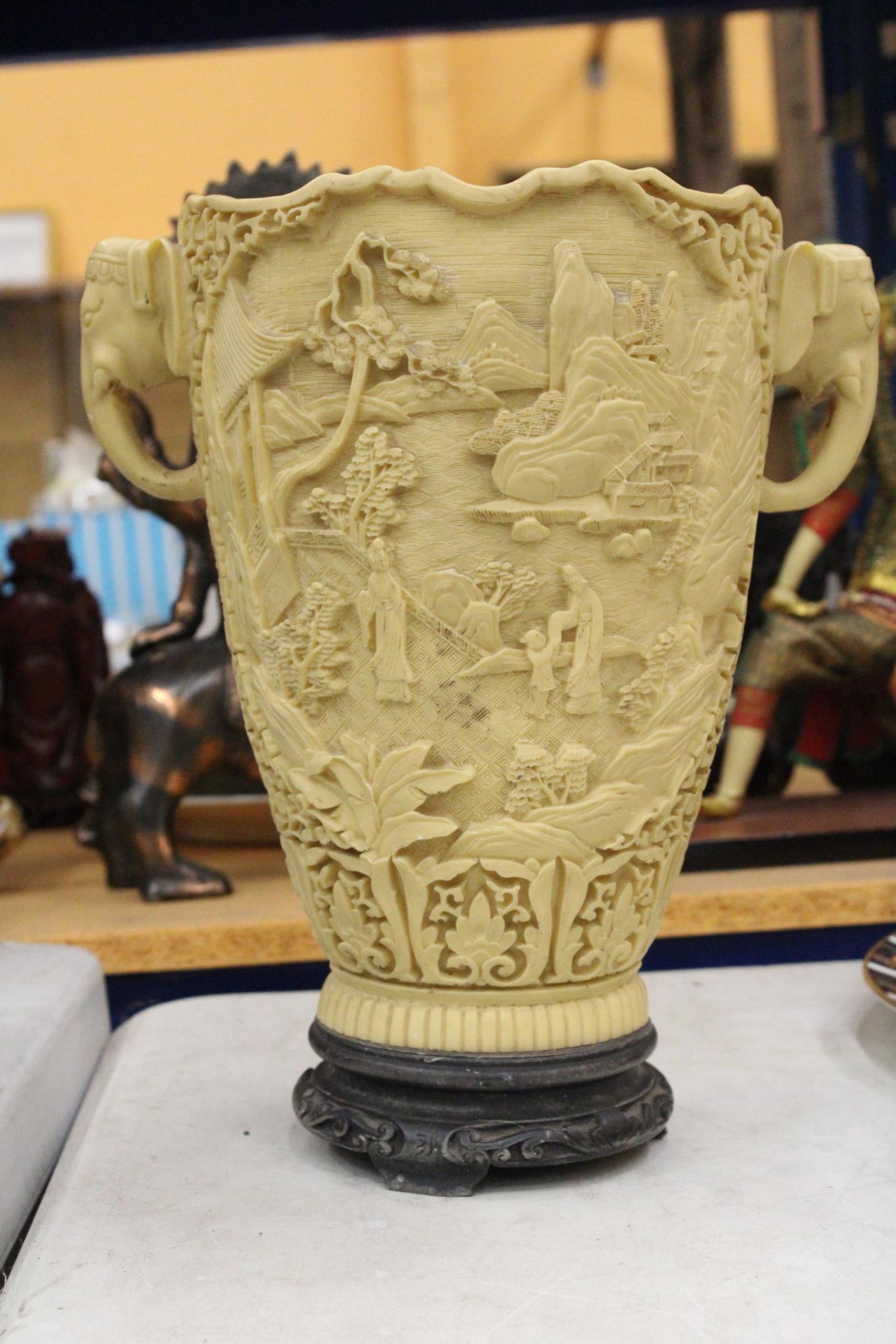 A LARGE CHINESE CARVED RESIN VASE WITH ELEPHANT HANDLES - Image 2 of 9