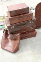 FIVE VINTAGE LEATHER TRAVEL CASES AND A LEATHER BAG
