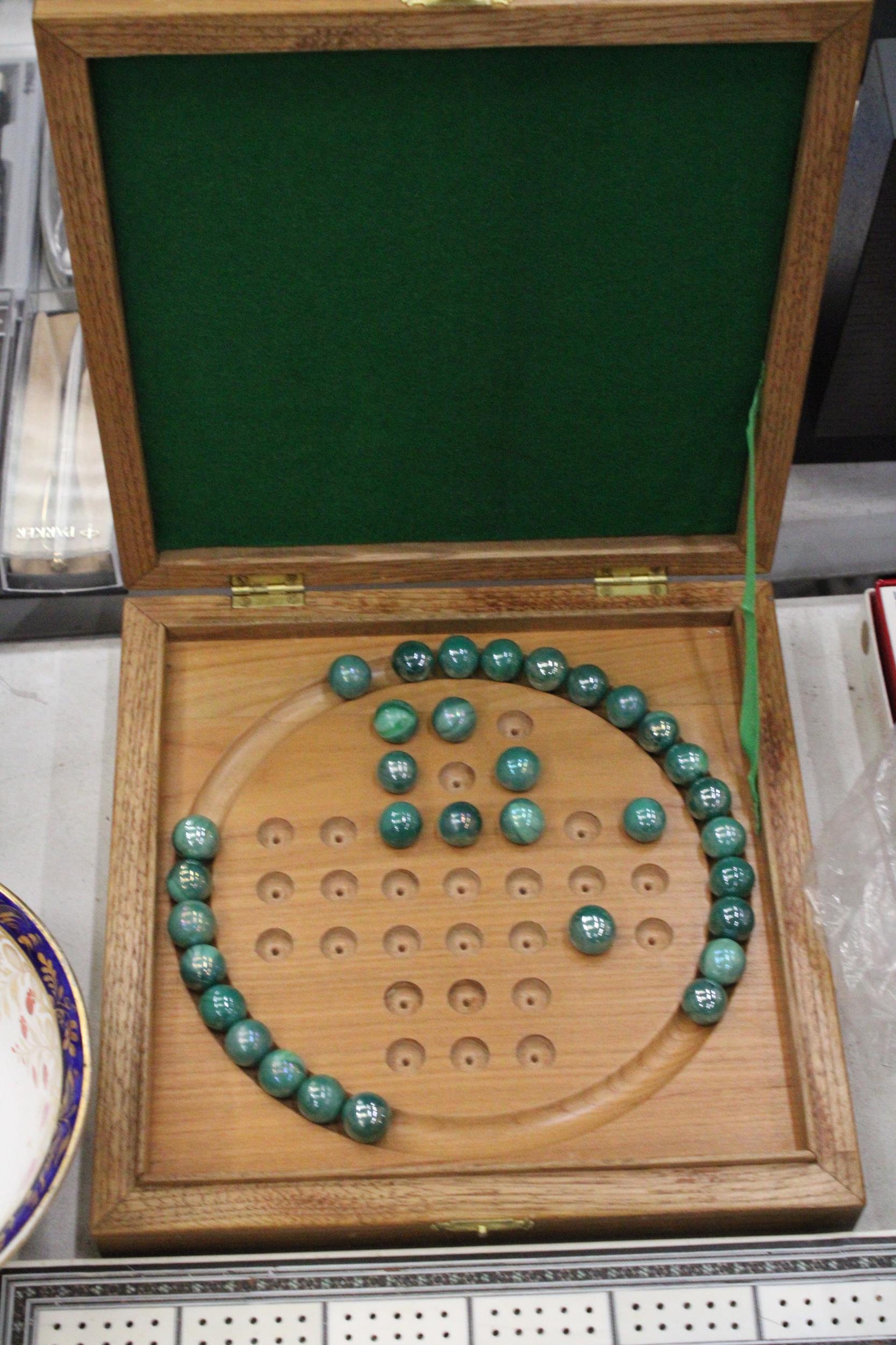 A BOXED WOODEN SOLITAIRE BOARD WITH MARBLES PLUS A VINTAGE CRIBBAGE BOARD - Image 2 of 5