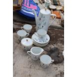 A MADE IN GERMANY CERAMIC COFFEE SERVICE FOR FOUR PEOLE