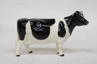 A BESWICK MODEL OF A FRIESIAN COW "CLAYBURY LEEGWATER"