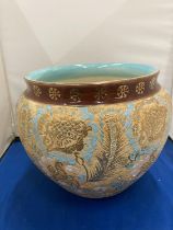 A ROYAL DOULTON LAMBETH CHINE JARDINERE PLANTER HAND DECORATED IN A FLORAL DESIGN WITH TURQUOISE AND