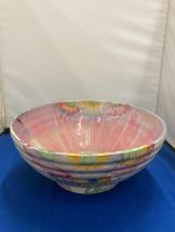 A CLARICE CLIFF NEWPORT POTTERY BOWL PATTERN HAND PAINTED IN YELLOWS AND PINKS