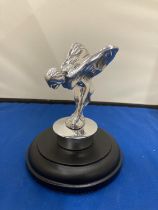 A CHROME SPIRIT OF ECTASY ON A BASE