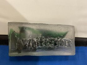 A CLEAR AND GREEN GLASS ADVERTISING BLOCK, STAMPED WHITEFRIARS, 14CM X 7CM AT WIDEST POINT X 5.5CM