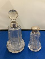 TWO GLASS PERFUME BOTTLES WITH HALLMARKED SILVER TO INCLUDE A LONDON 1909 BY SCHINDER & CO AND ONE