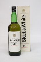 A 1 LITRE BOTTLE OF BLACK AND WHITE CHOICE OLD SCOTCH WHISKY A PRODUCT OF SCOTLAND