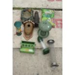 AN ASSORTMENT OF ITEMS TO INCLUDE A BIRDBATH, FEEDERS AND PEANUTS ETC