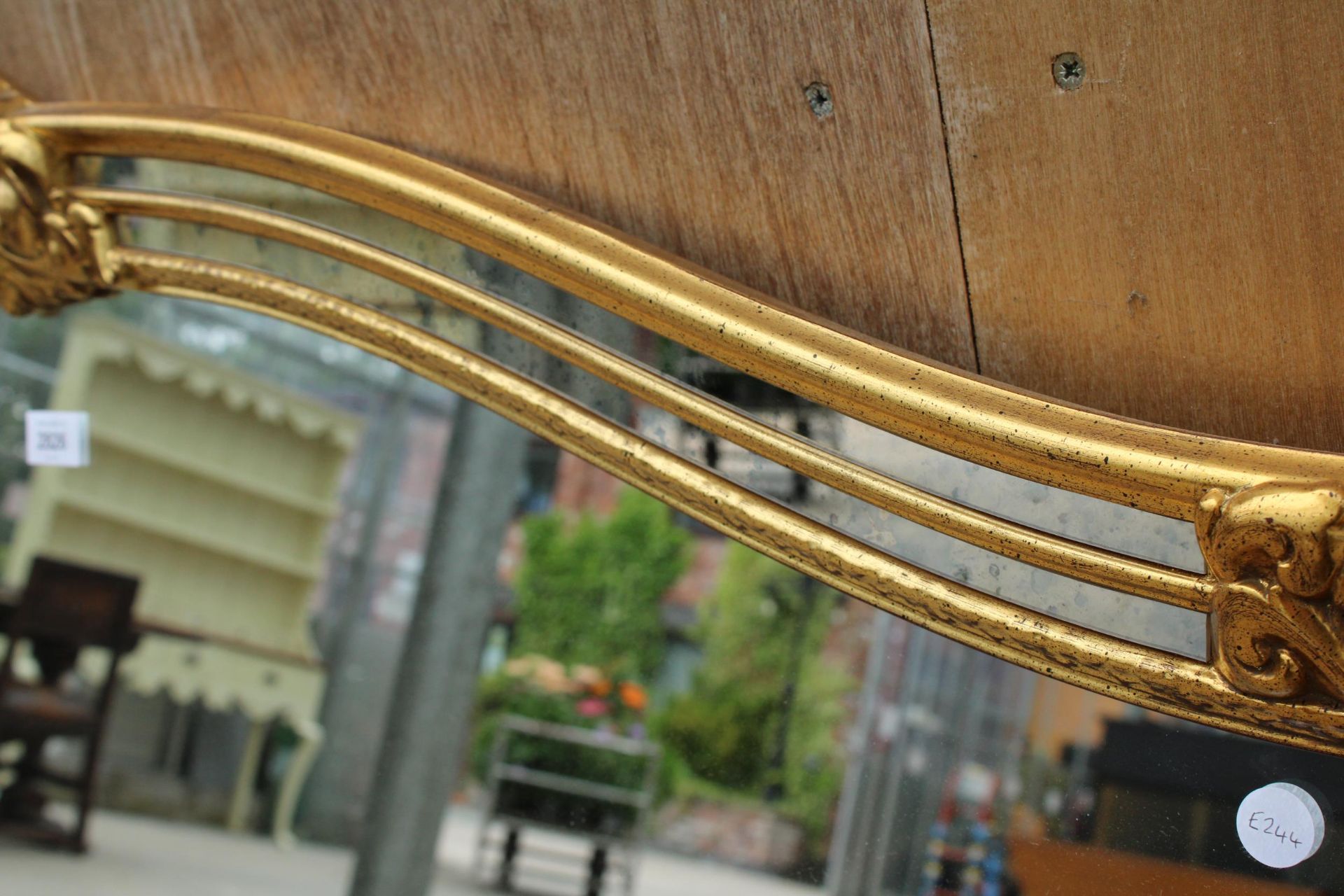 A GILT EFFECT OVERMANTEL MIRROR WITH DOUBLED MIRRORED EDGE AND FOLIATE DECORATION - Image 4 of 4