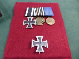 A FRAMED AND GLAZED MEDAL GROUP OF UNKNOWN AGE COMPRISING IMPERIAL GERMAN IRON CROSS FIRST CLASS,