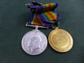 A WORLD WAR I MEDAL PAIR AWARDED TO 210950 DRIVER F.R. AXTOR ROYAL ARTILLERY