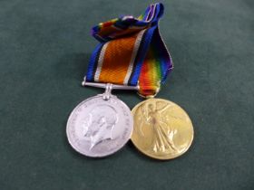 A WORLD WAR I MEDAL PAIR AWARDED TO 2250 DRIVER T.M. HUNTER ROYAL ARTILLERY