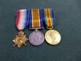 A WORLD WAR I MINIATURE MEDAL TRIO