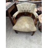 A VICTORIAN WALNUT UPHOLSTERED TUB CHAIR