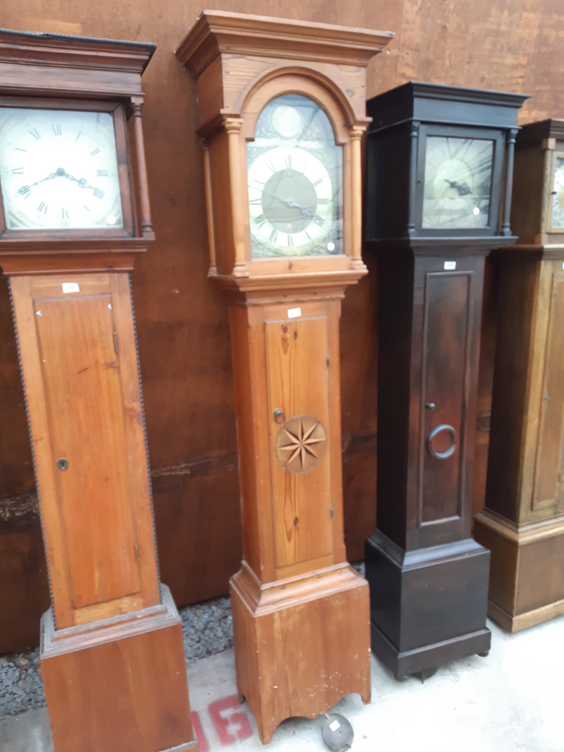 A WOOD OF SCARBOROUGH EIGHT DAY LONGCASE CLOCK WITH BRASS DIAL