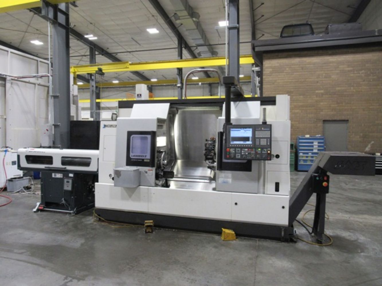 QUALTECH INDUSTRIES, INC. - Late Model Okuma CNC Multi Axis Turning, Tsugami Swiss Lathes & CNC Machining