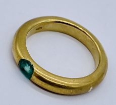 An 18ct gold ring set with an emerald, weight 8.1g