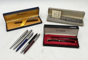 A collection of vintage pens including Waterman, Parker etc.