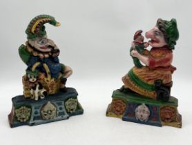 A painted cast iron Punch and Judy doorstop set