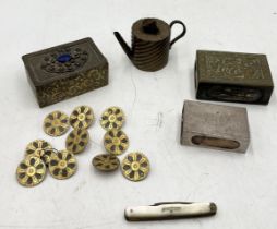 A hallmarked silver match box holder along with a set of brass buttons etc.