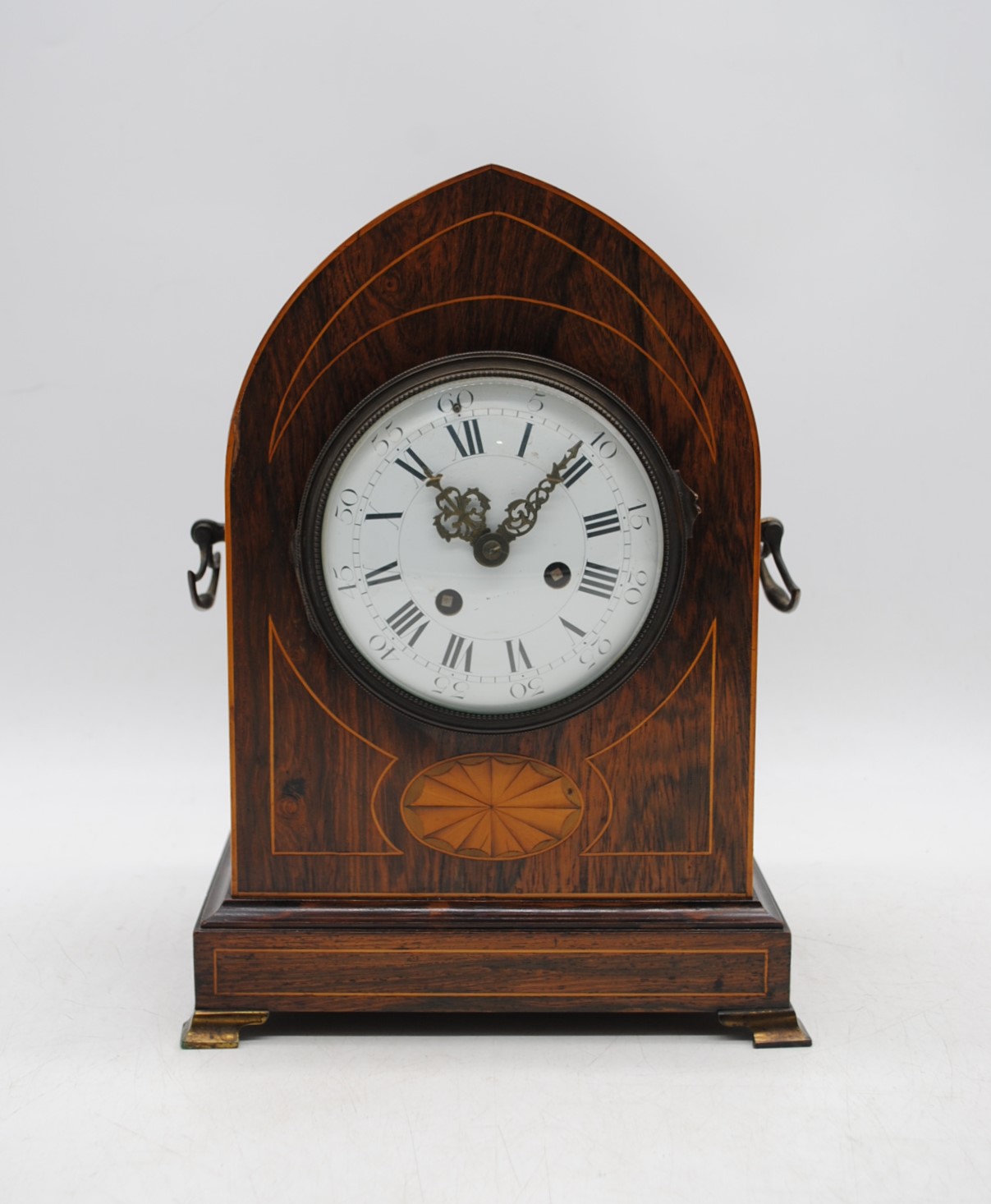 An Edwardian inlaid mantel clock, with keys