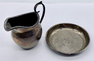 A small hallmarked silver jug along with a silver pin dish