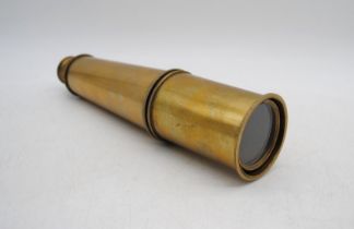 A brass four draw telescope, marked 'Broadhurst Clarkson & Co, London, 1942'