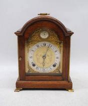 A small oak bracket clock by 'Elliot'