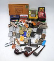 A collection of various lighters, including Zippo, Ronson, Mosda, Rothmans etc, along with some