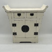 A Japanese white painted cabinet. 50cm x 25cm, height 45cm