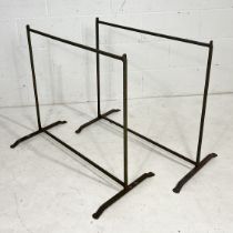 A pair of vintage metal trestle bases