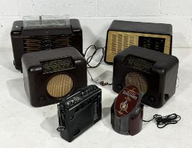 A collection of four vintage radios including Bush, Philips etc. along with a vintage telephone