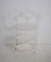 A white painted wrought iron three tier stand - length 58cm, height 104cm