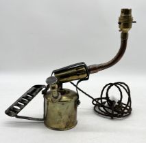 A steampunk style lamp made from a Bladon blowlamp along with an antique brass door handle