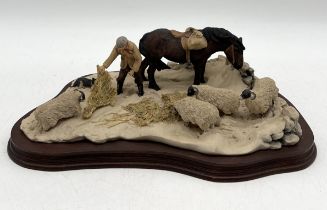 A limited edition Border Fine Arts figure group Winter Feeding by Judy Boyt numbered 625/1250