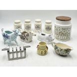 A collection of china including three cow creamers, one by T.G. Green, set of four spice jars etc.