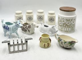 A collection of china including three cow creamers, one by T.G. Green, set of four spice jars etc.